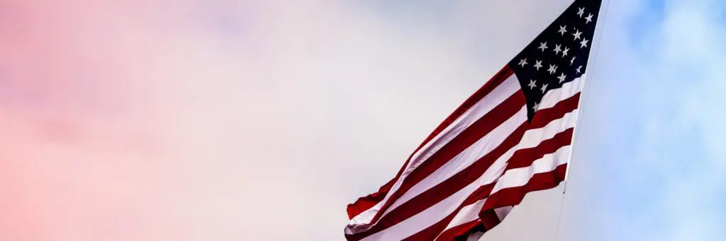 American flag and 4th of July celebration with military service members